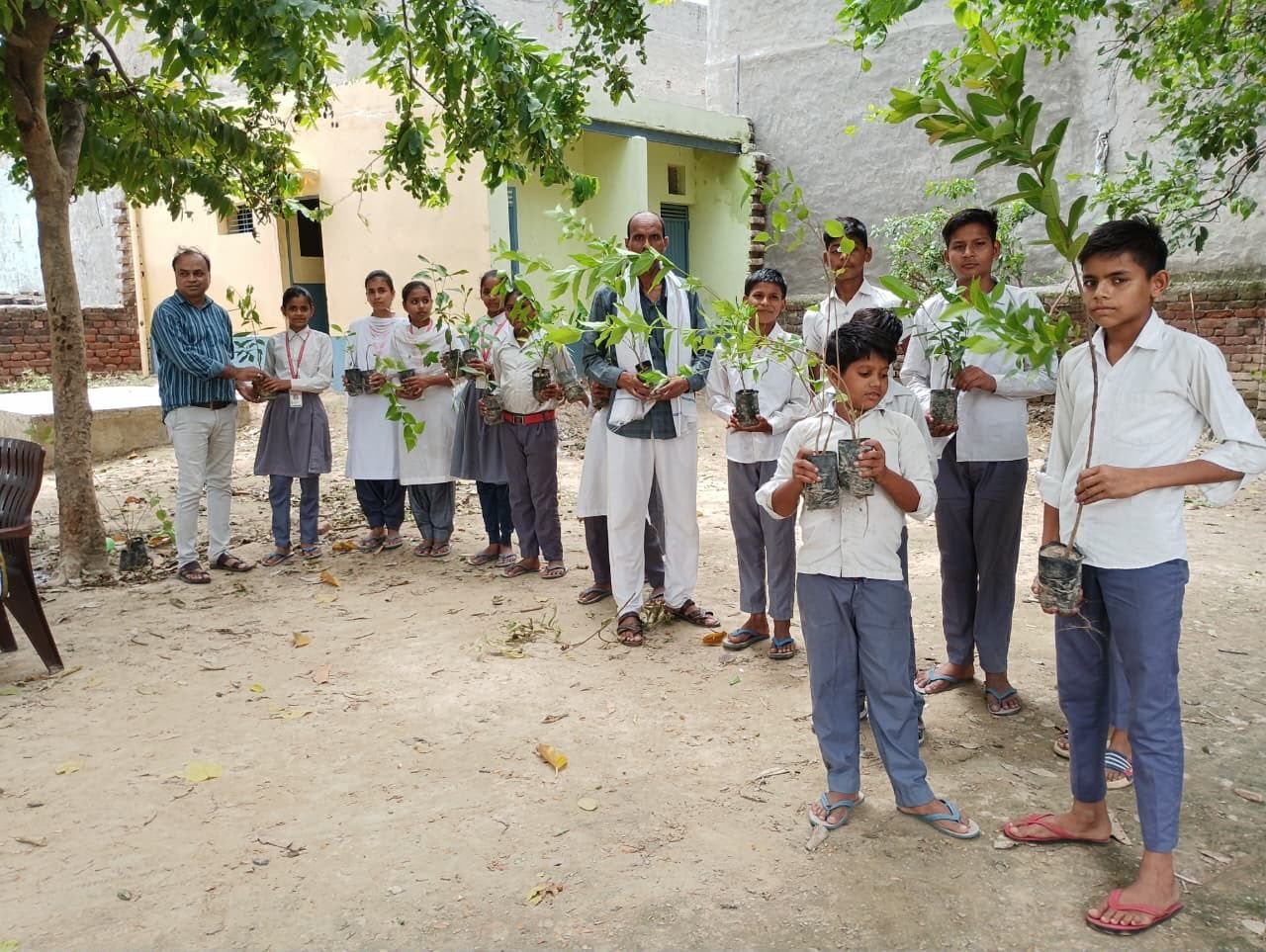 Green messengers — children with their saplings (2026)
